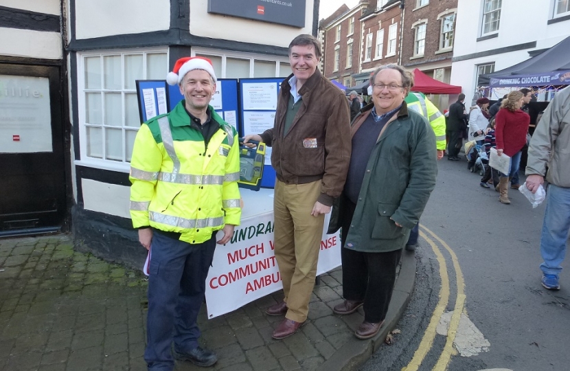 Philip Dunne with Cllr David Turner and Community First Responder Robin Bennett