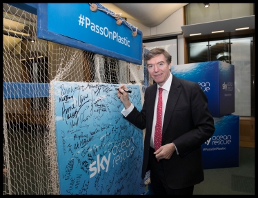 ​​Philip signing the Sky Ocean Rescue pledge